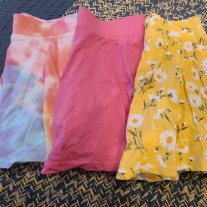 Three Children's Place skirts with built in shorts
